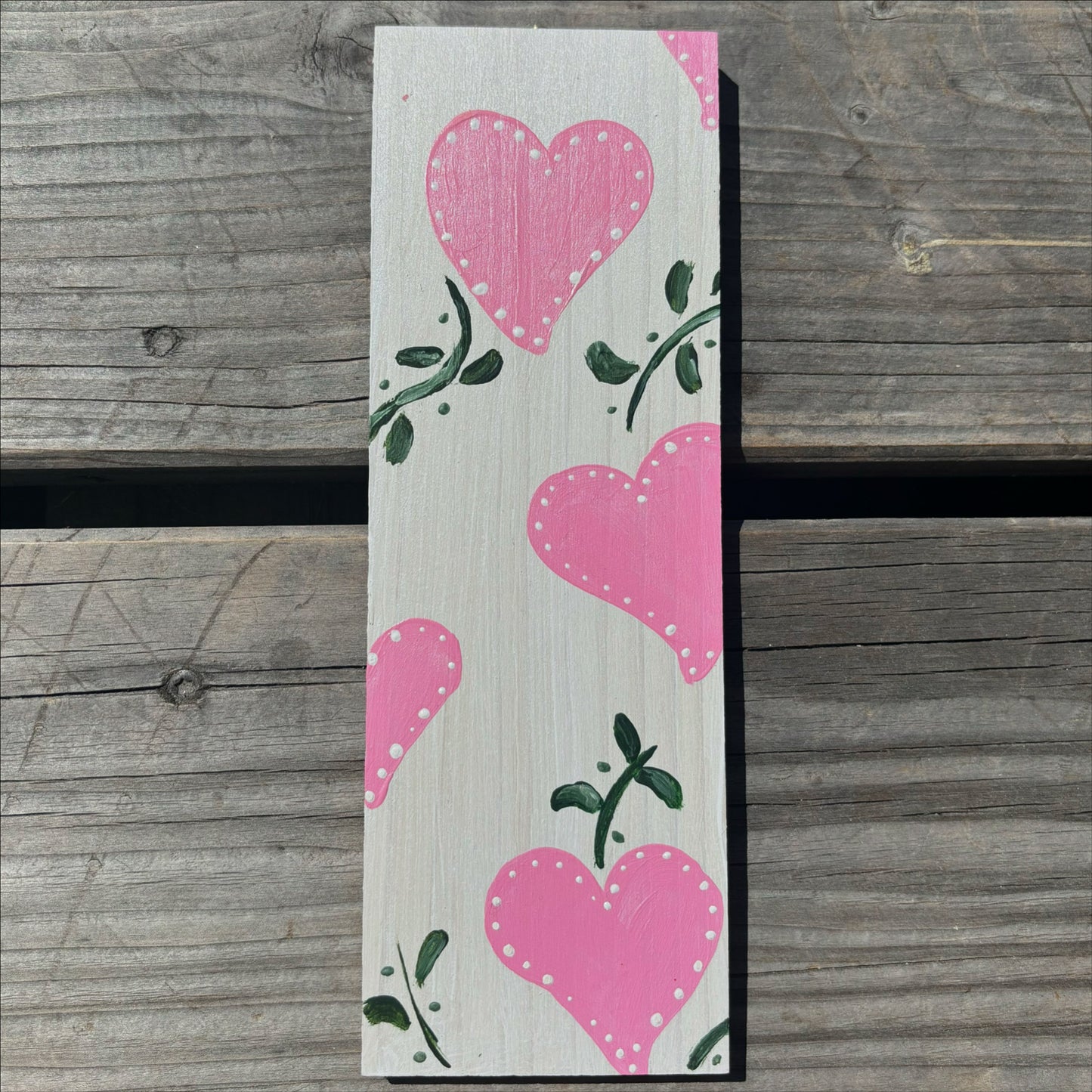Wandbild mit rosa Herzen