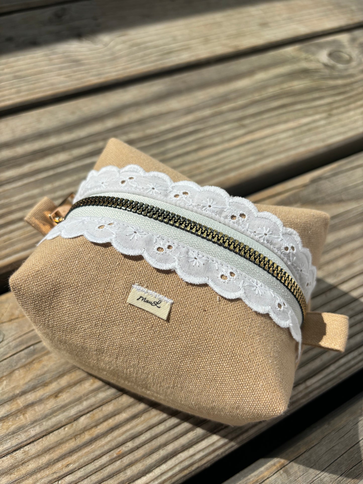 Kleine beige Kulturtasche